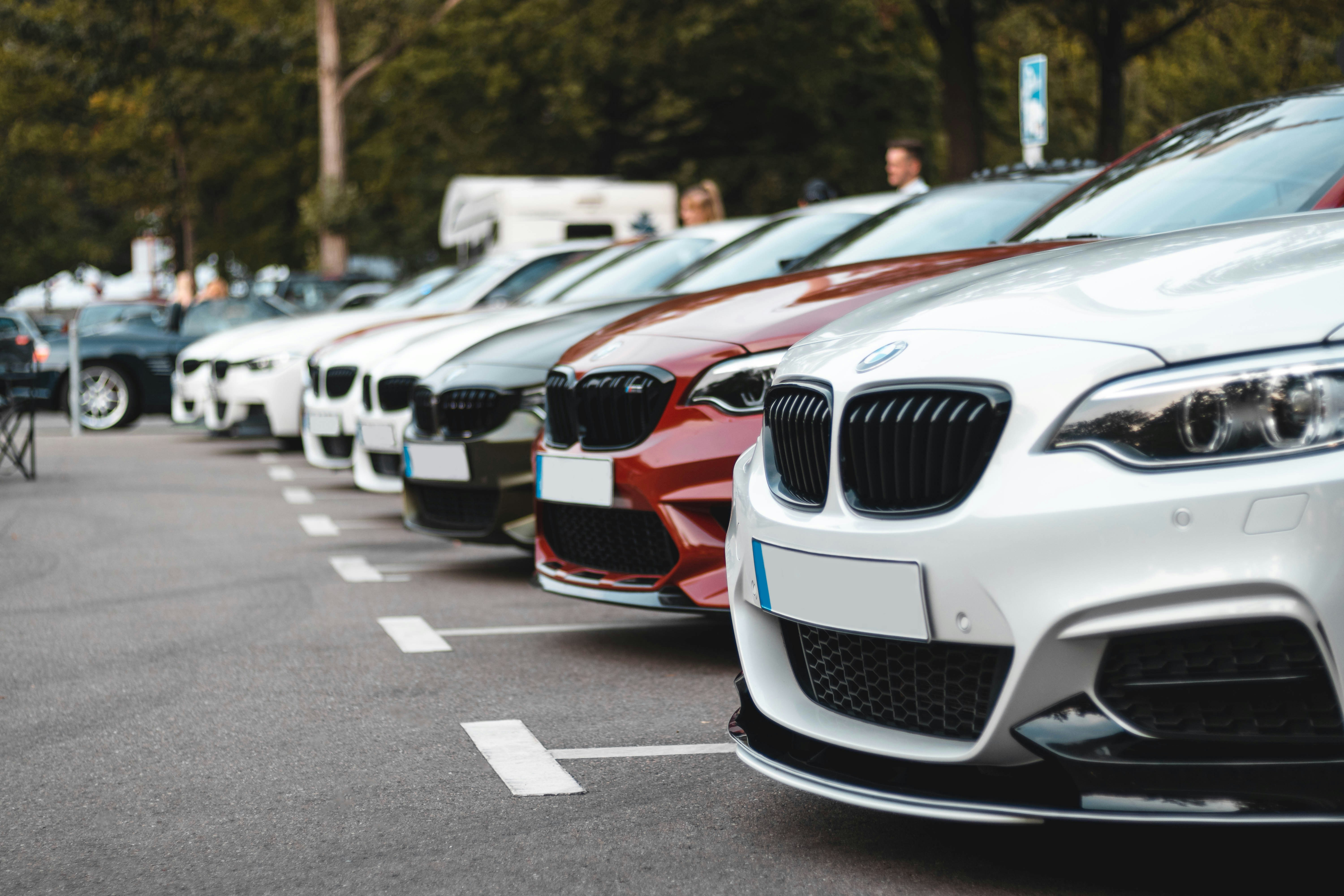 Row of BMW cars in a dealership lot